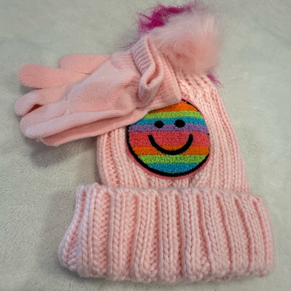 Sparkle girls pink pom Pom hat glove sets with a rainbow smiley face patch OSFM